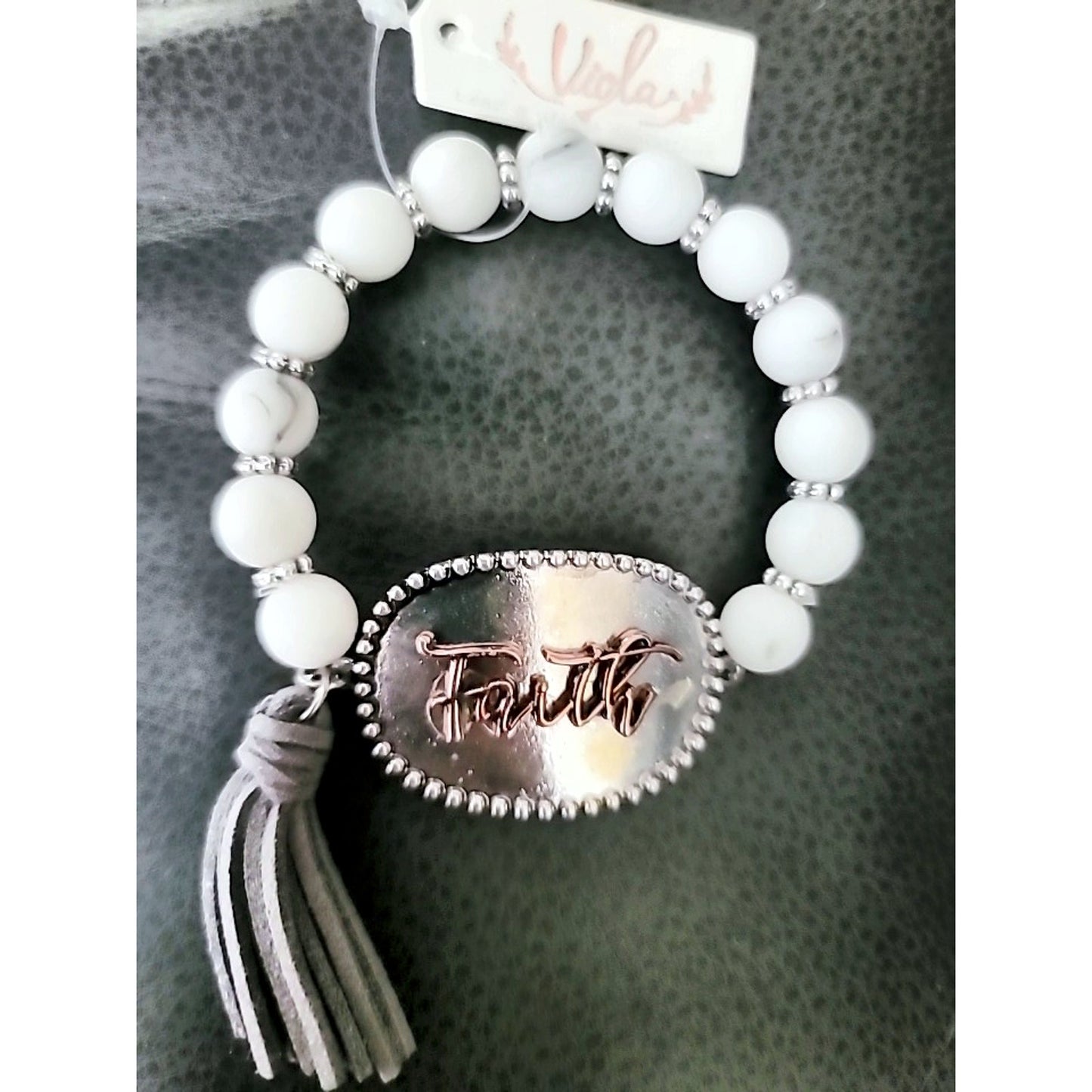 Faith Stretch Bracelet with Leatherette tassle NEW